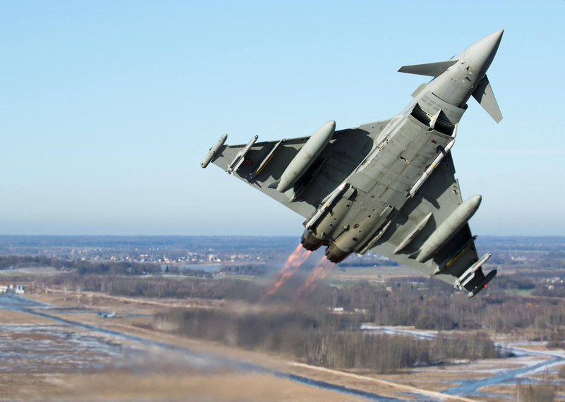 Illustration for article titled These Shots Of Fulcrums and Eurofighters Over Lithuania Are Amazing